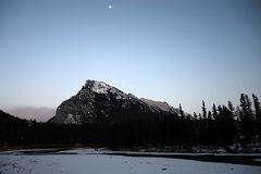 21 Moon Over Mount Rundle At Sunset From Bow River Bridge In Banff In Winter.jpg